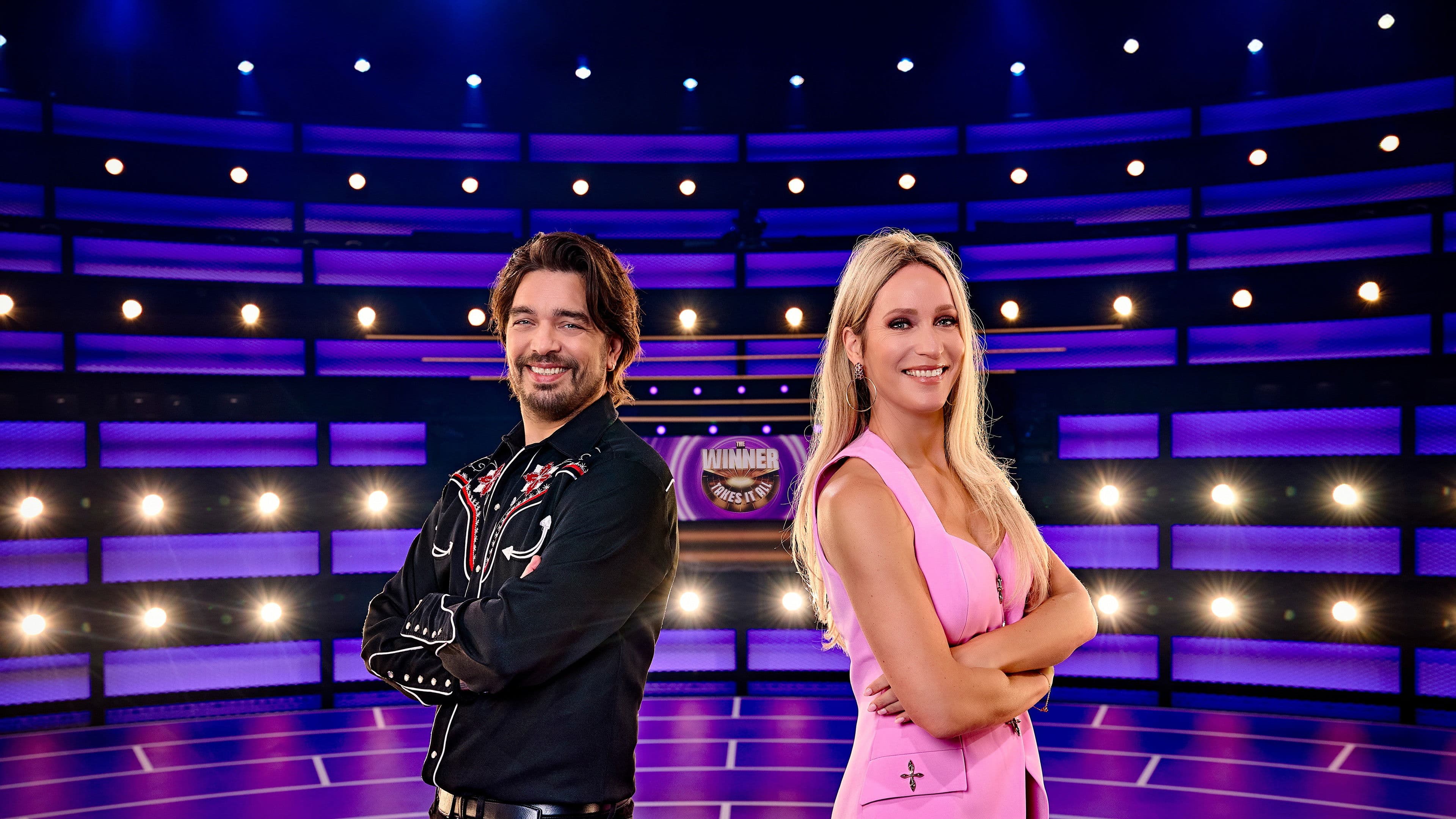 The Winner Takes It All backdrop